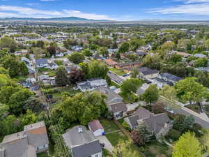 View of property location with mountains and nearby suburban area