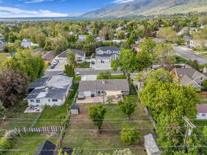 Aerial view of residential area featuring a mountain backdrop