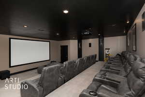 Home theater with light carpet and recessed lighting