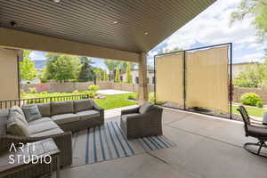 View of patio with an outdoor living space