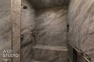 Bathroom view of a tile shower