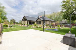 View of sport court featuring basketball court