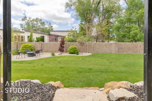 View of yard featuring a patio