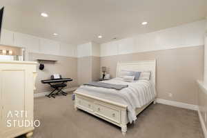 Bedroom featuring light colored carpet, recessed lighting, and baseboards