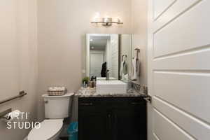 Bathroom with toilet and vanity