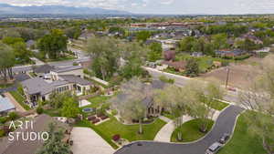 View of property location with a mountain backdrop and nearby suburban area