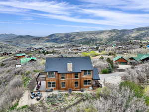 View of subject property with a mountainous background