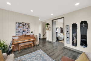 Sitting room featuring wood finished floors, recessed lighting, and baseboards