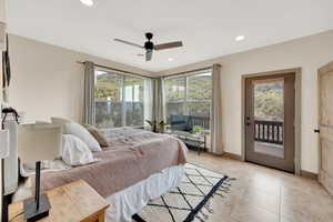 Bedroom featuring access to outside, baseboards, recessed lighting, a ceiling fan, and light tile patterned floors