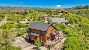 View of subject property featuring mountains