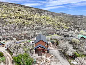 View of subject property with a mountainous background
