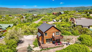 View from above of property featuring a mountain backdrop