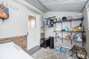 Storage area featuring electric panel
