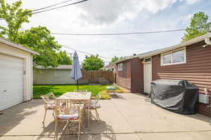 View of patio / terrace with outdoor dining area and a grill