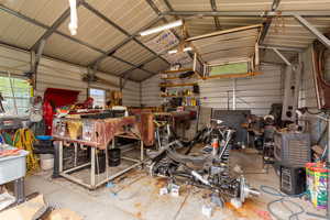 Garage featuring metal wall