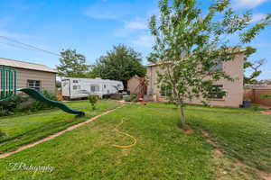 View of yard with a playground