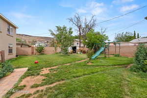 View of yard featuring a playground