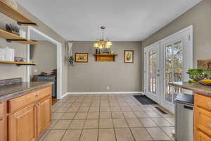 Light & Bright featuring stainless steel appliances & tons of storage.