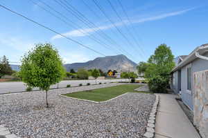 View of yard with a mountain view