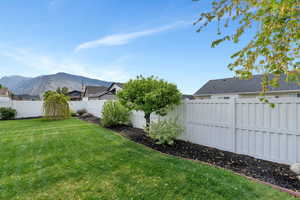 View of yard with a mountain view