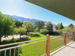 Balcony featuring a deck with mountain view