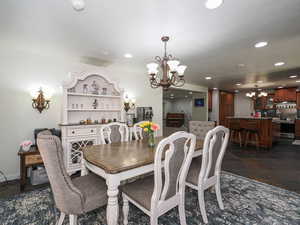 Dining area featuring a chandelier and recessed lighting