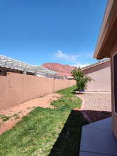 View of yard with a mountain view