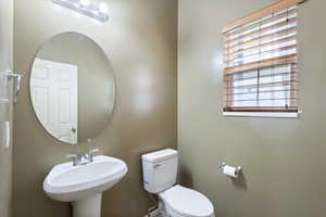 Bathroom featuring toilet and a sink