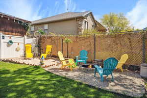 View of yard featuring a fire pit