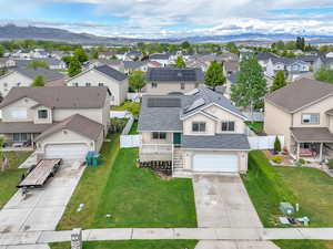 Aerial view of residential area with a mountain backdrop