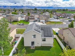 Aerial view of residential area with a mountainous background