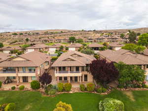 Aerial view of residential area featuring a mountainous background