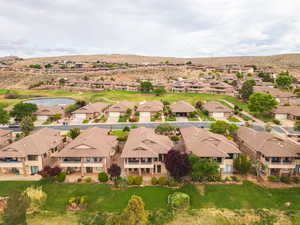 Aerial view of residential area featuring a water and mountain view