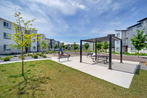 View of community with a residential view and a yard