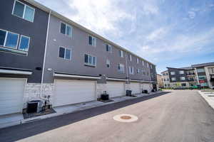 View of asphalt road with a residential view