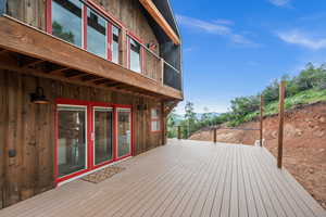 Wooden terrace featuring a mountain view