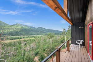 Balcony featuring a mountain view