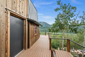 Wooden deck with a mountain view