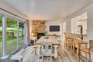 Dining space with light wood-type flooring