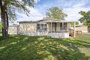 View of front of property featuring a front yard