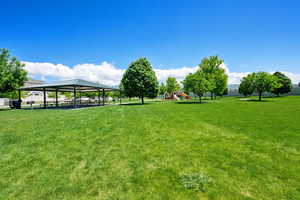 View of grassy yard with a gazebo