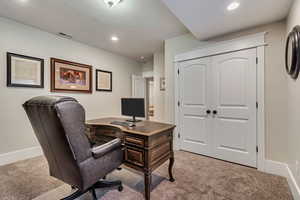 Office space featuring carpet floors, recessed lighting, and baseboards