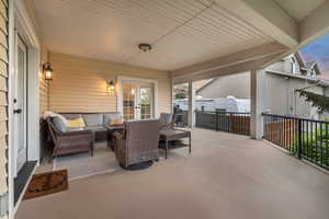 View of patio featuring french doors and an outdoor hangout area