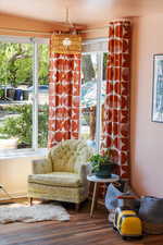 Sitting room with wood finished floors