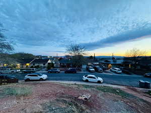 View of parking featuring a residential view