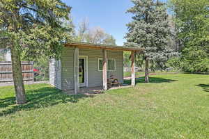 Large shed for your riding lawn mower or perhaps a private backyard studio?