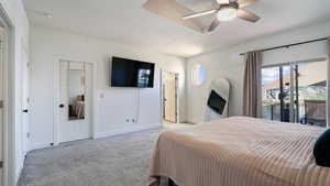 Carpeted bedroom featuring baseboards, a textured ceiling, access to outside, and a ceiling fan