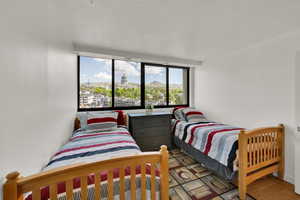 Bedroom featuring wood finished floors