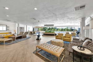 Lobby featuring a textured ceiling and recessed lighting