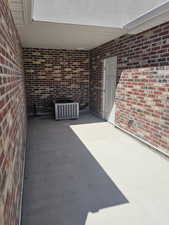 View of patio / terrace featuring cooling unit